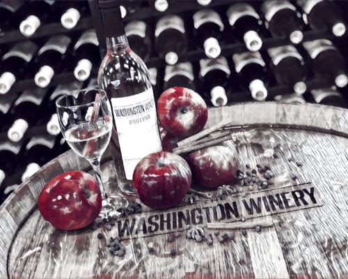 washington winery bottles and glass, apples