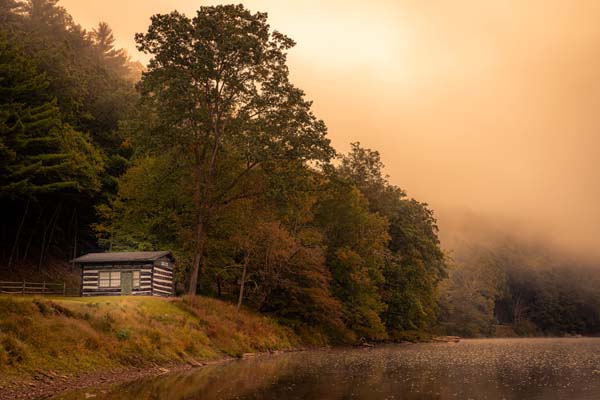 cabin by river