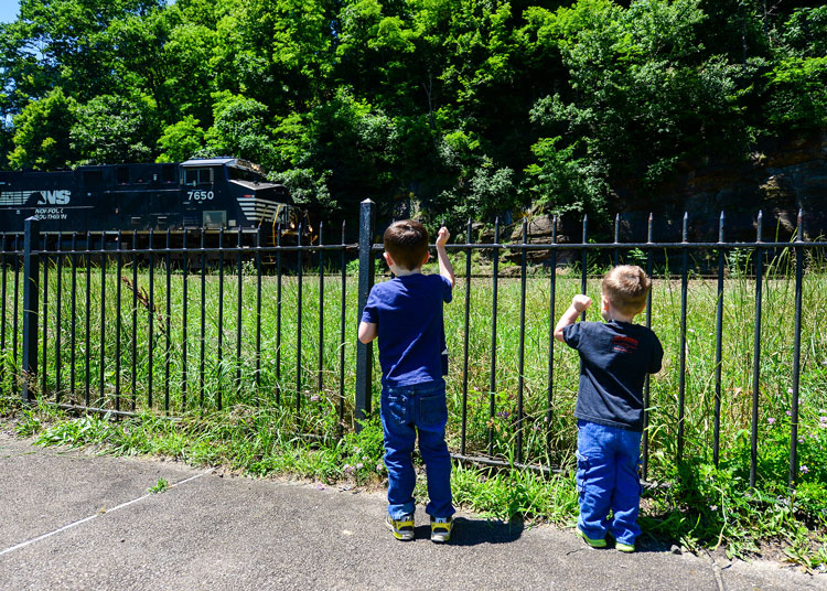 Kids watching rail wagon