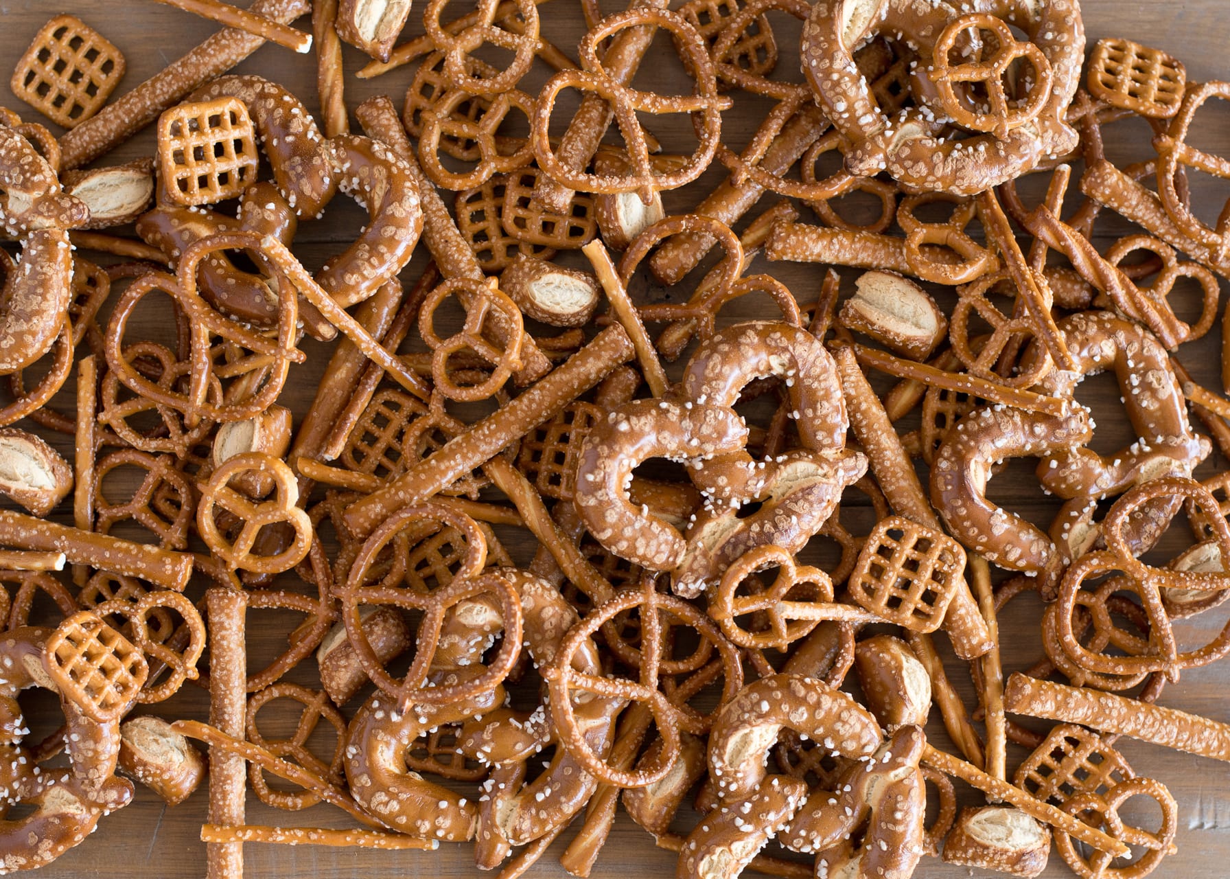 Photo of a pile of various types of small pretzels