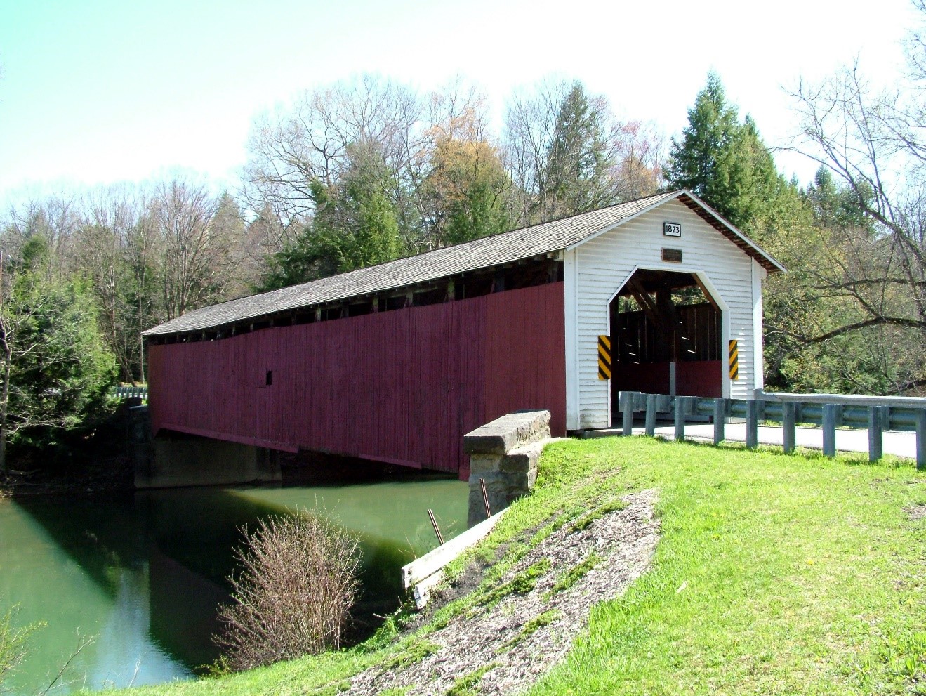 covered bridge over river creek