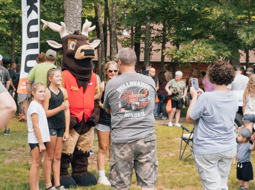 people taking pictures with Elk poser