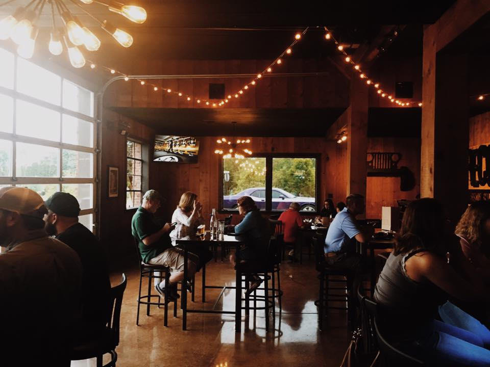 people enjoying inside brewery