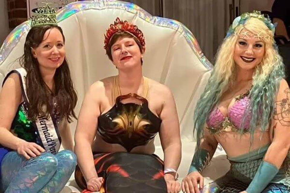 three ladies dress in mythical characters at mythicon