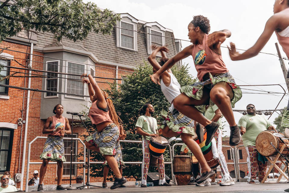 people performing on street