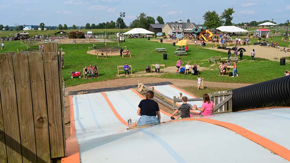 people sliding at Irons Mill Farmstead