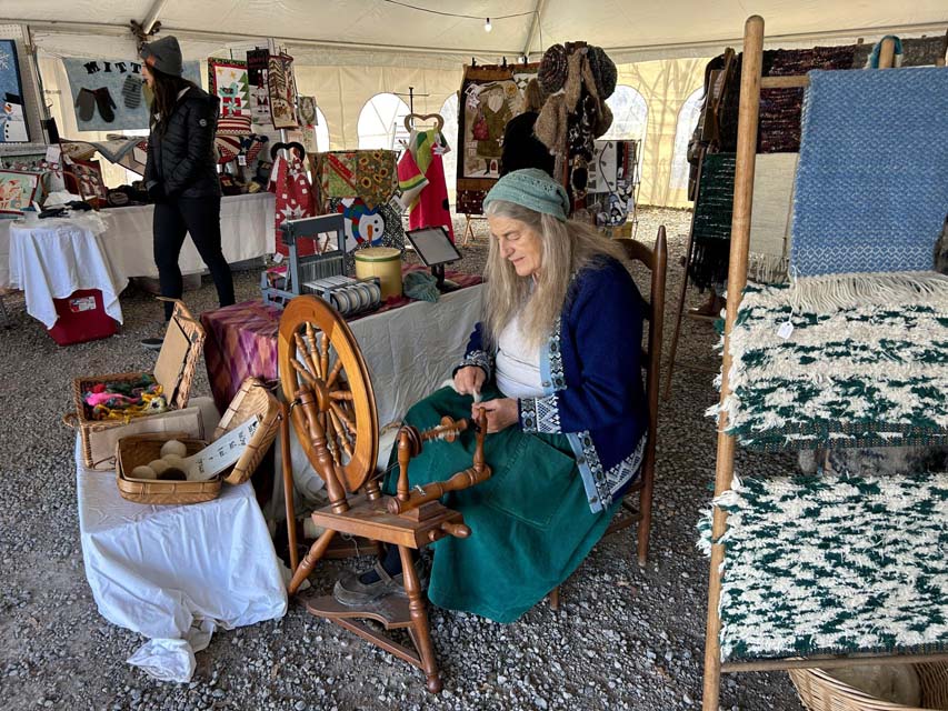 a women spinning wool
