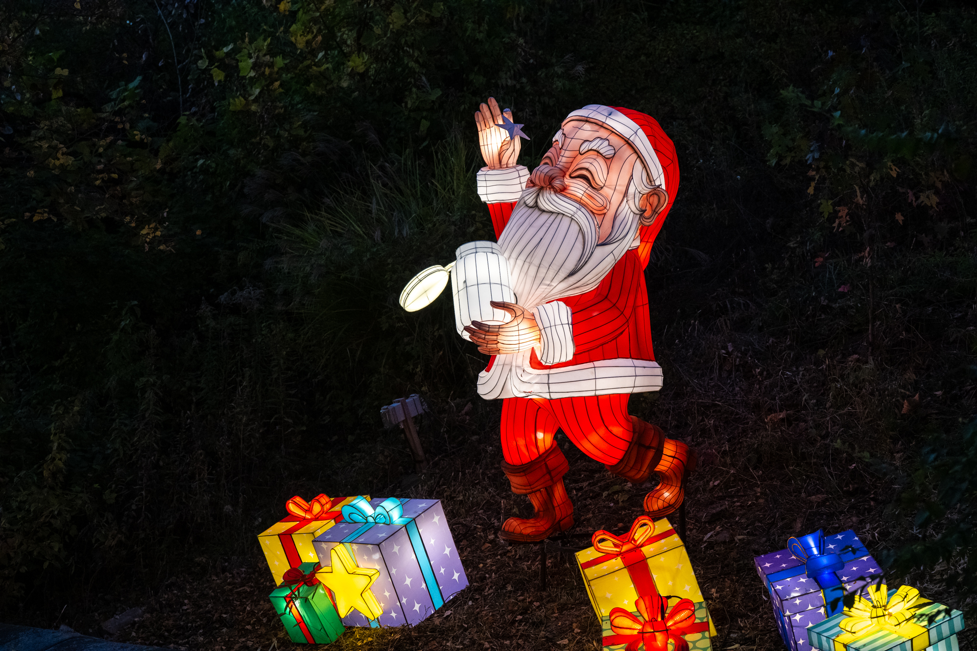 santa illuminated with gifts