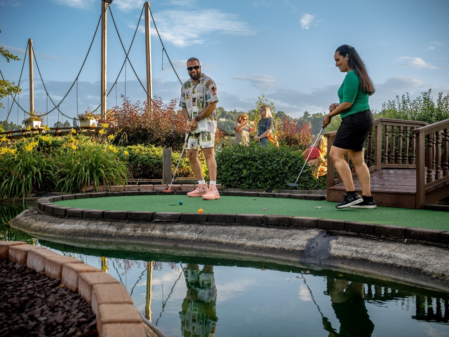 couple playing water golf