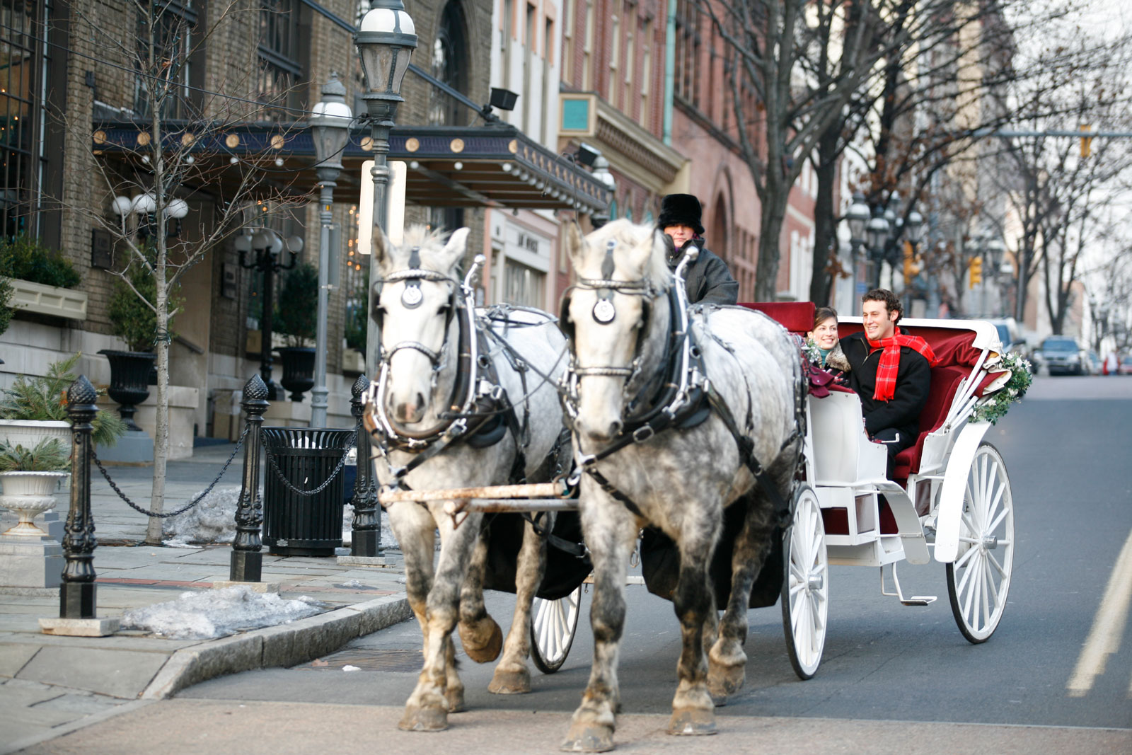 Horse carriage rides thru downtown main streets