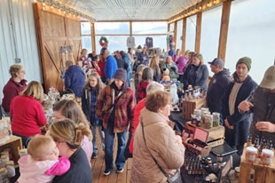 people gathered at Local Christmas at Lone Oak Farms