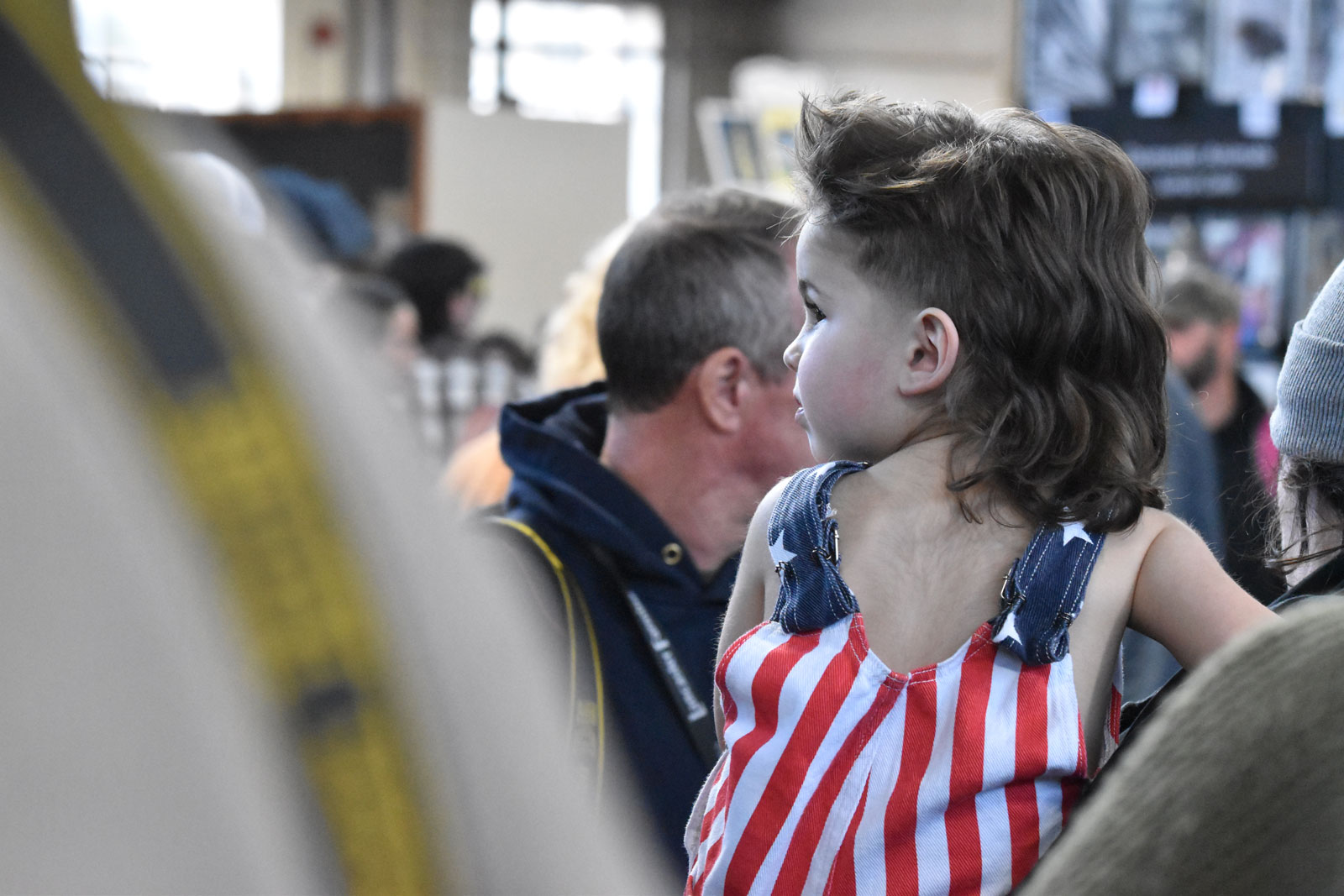 A kids with magnificent mullet