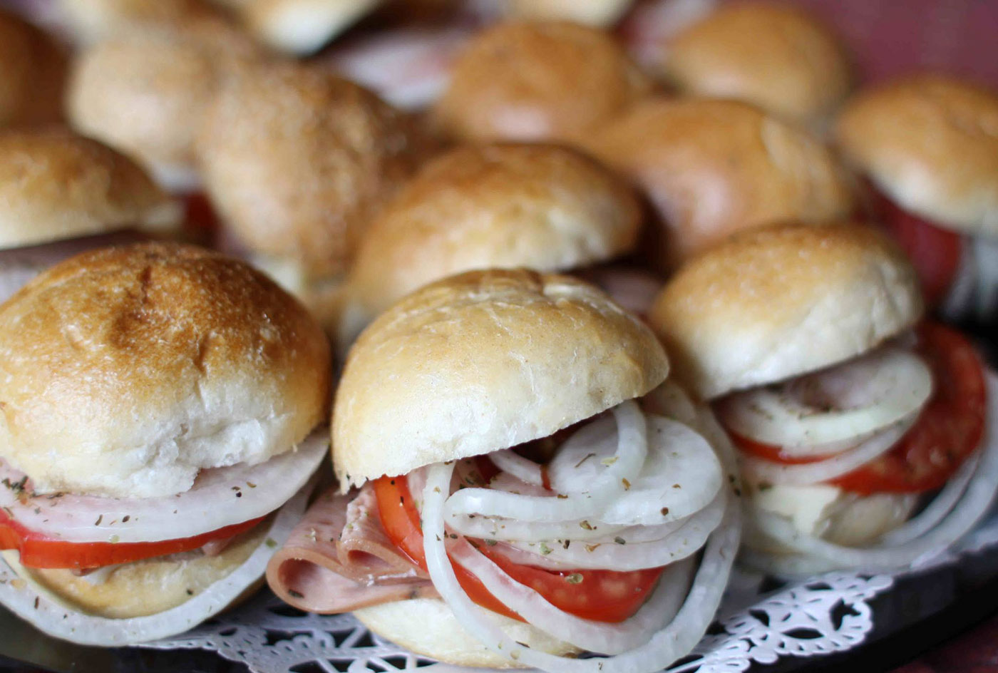 sandwiches with steak onion and tomato ready to grab