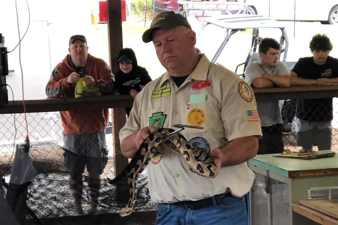 snake charmer demonstrating a snake