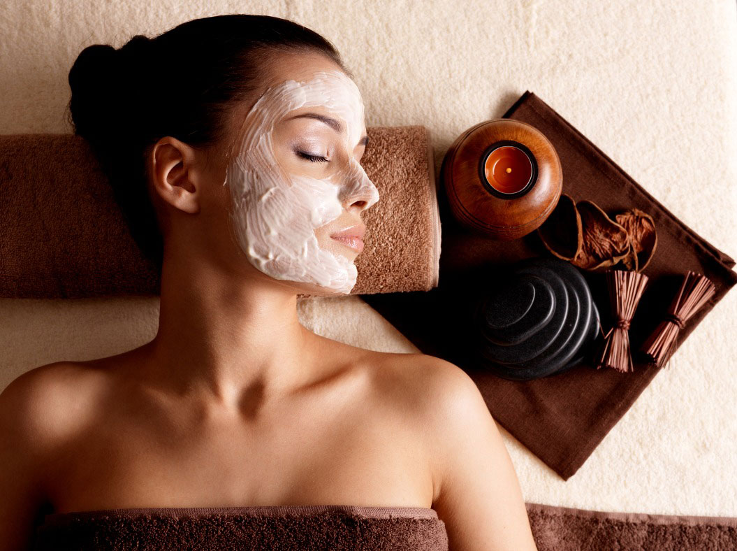 A women laying down with facemask at the spa at the Hotel Hershey