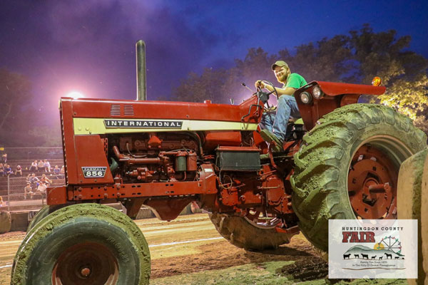 A person sitting on Tractor