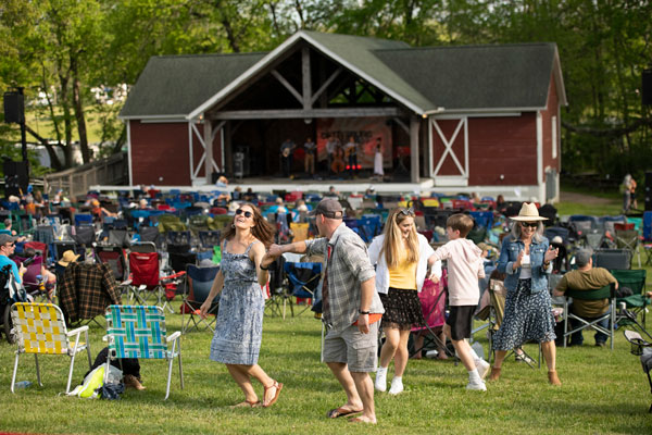 people dancing on grass