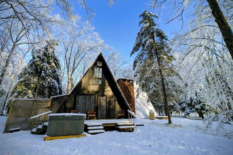 Cabin house covered with Snow