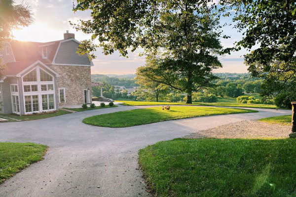 A driveway leading to a house