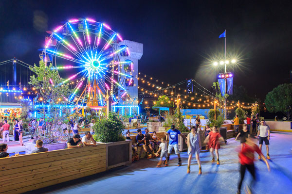 People skating on ice rink