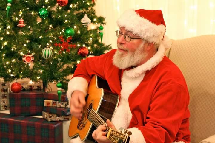 Santa playing guitar at Blue Mountain