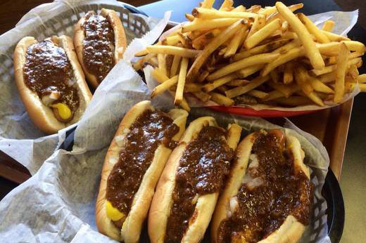 hot dog and fries on plate