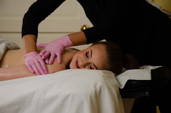 a women getting body spa treatment
