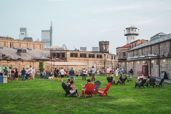 people sitting on Yard inside Eastern State Penitentiary
