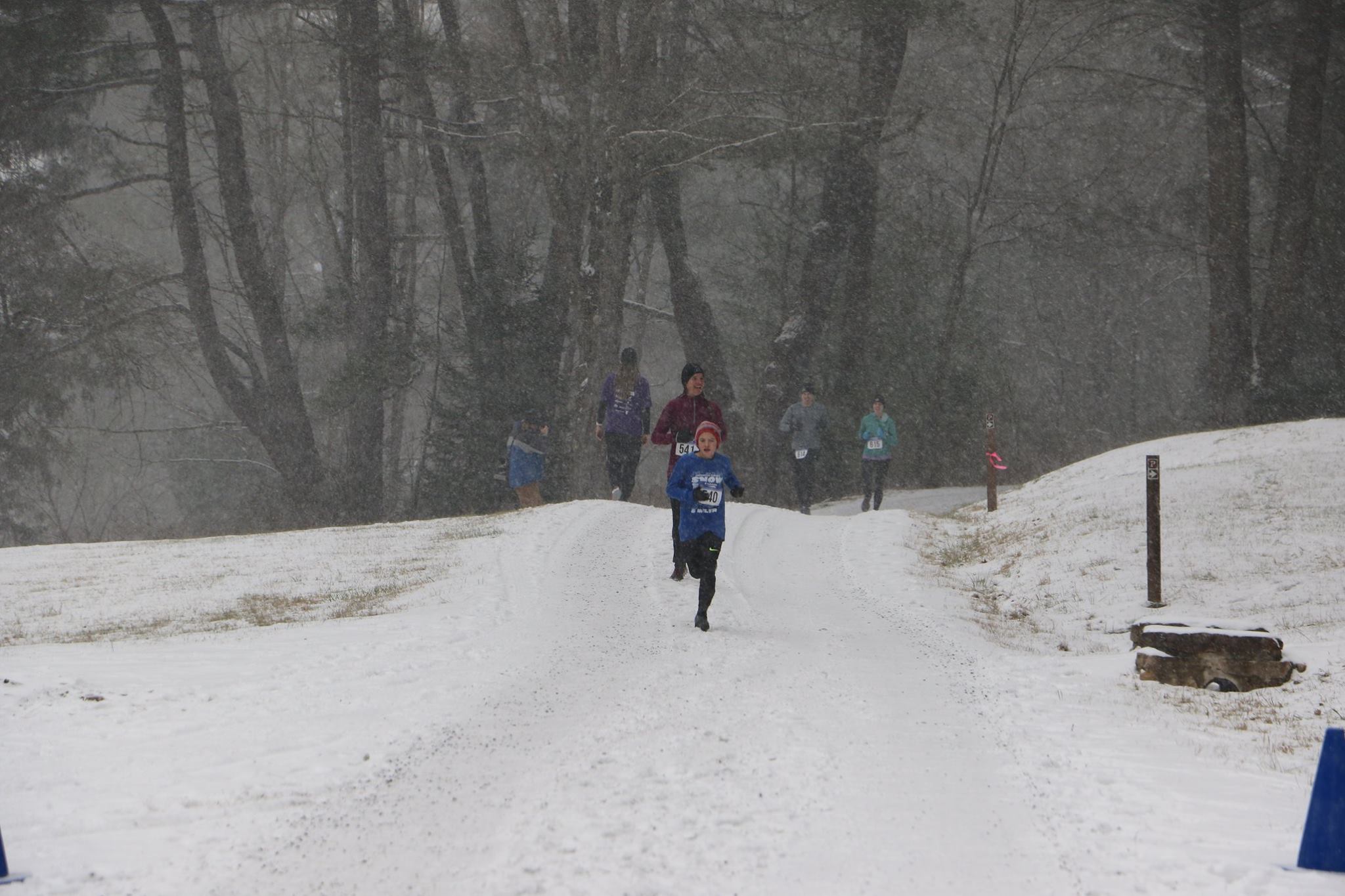 People jogging in the snow