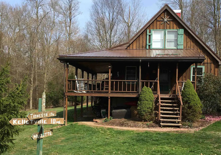 A house with a deck and stairs