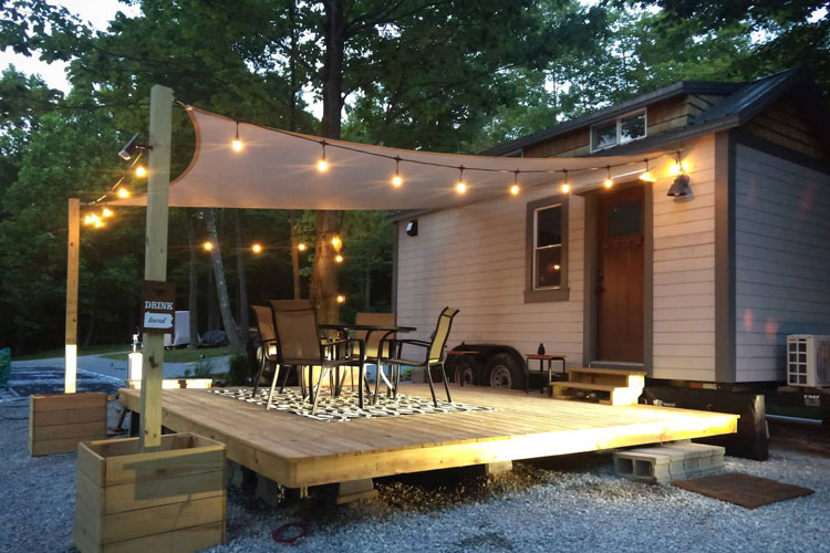 A house with a patio and a table and chairs