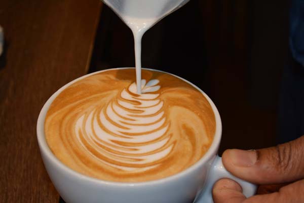 latte art on coffee