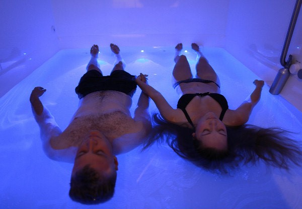 couple inside spa tub