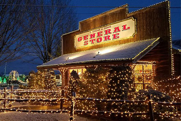 General store front decorated with holiday lights