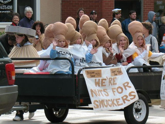 kids on wagon with peanut hats