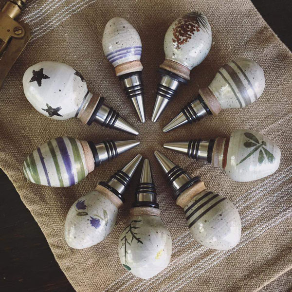 wine stoppers placed on top of a rug