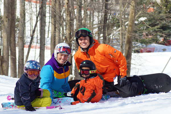 Family with ski gear on