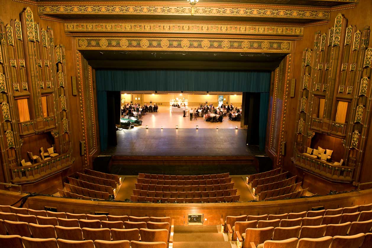 A large auditorium with a large stage