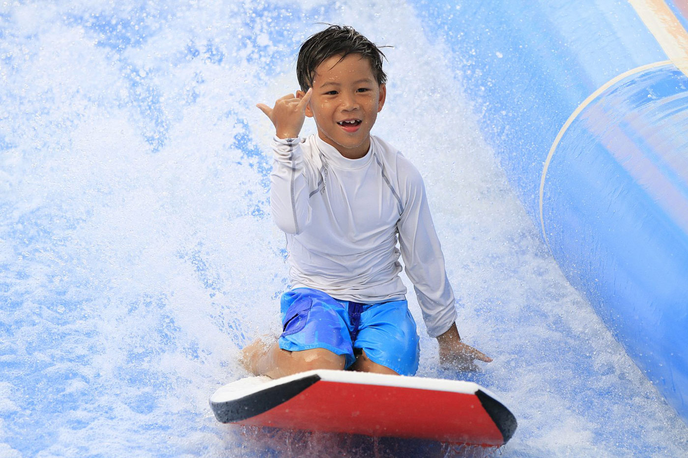 kid sliding water ride
