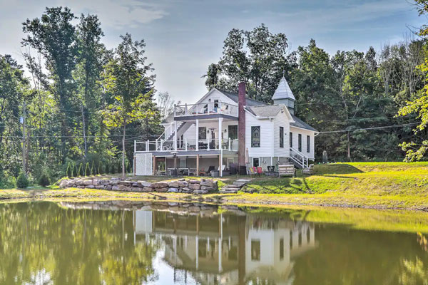 Beautiful house in front of a pond