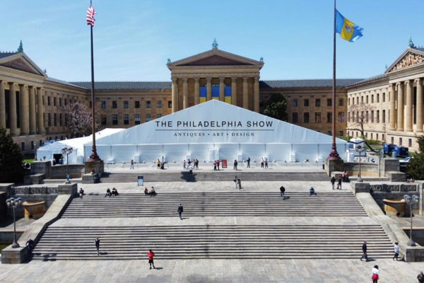 The philadelphia show signage up on staircase of Philadelphia museum