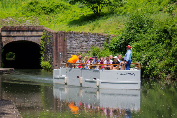 people taking guided tours on boat
