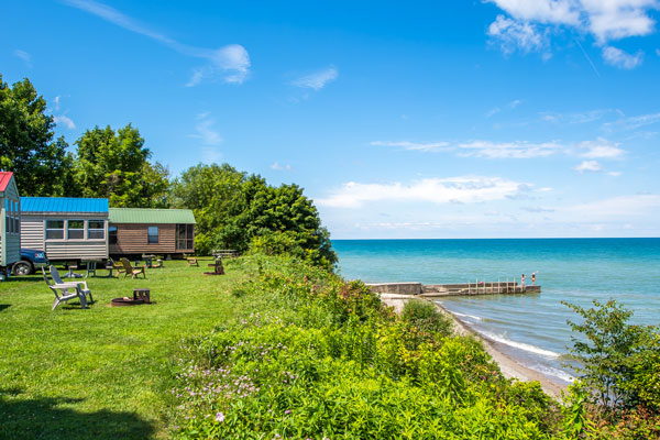 cabin houses by lake