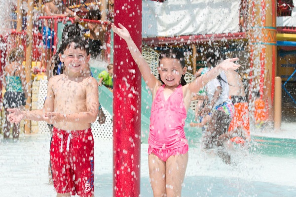 kids playing by waterpark