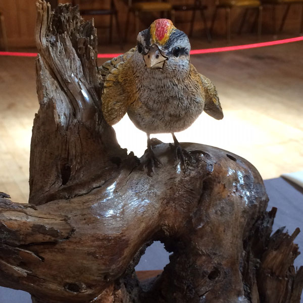 Wood carved bird sculpture