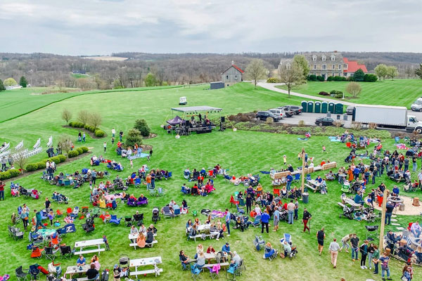 people sitting on lawn