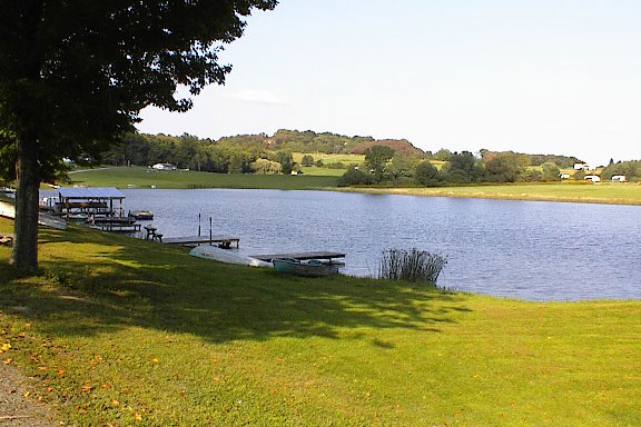 Campground by lake with boat docks