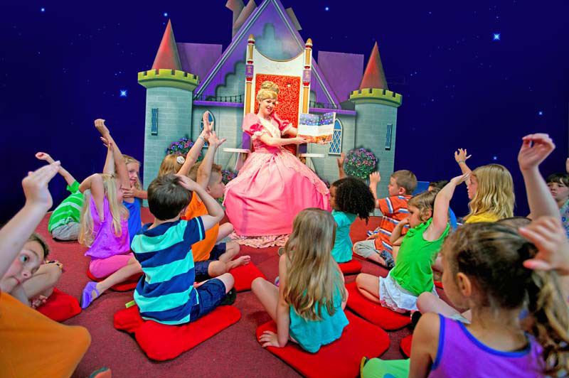 kids surrounding a princess
