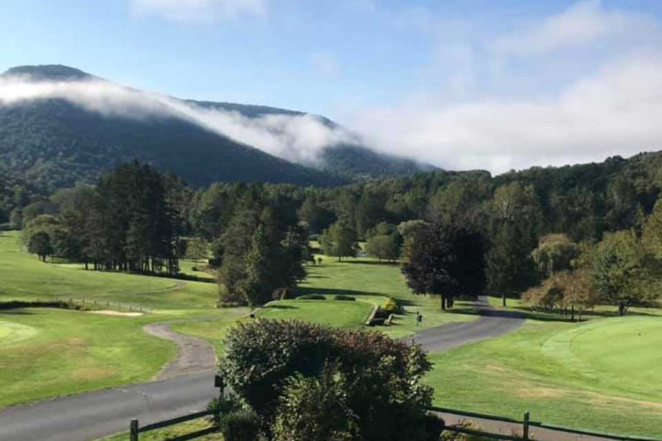 golf course in between hills