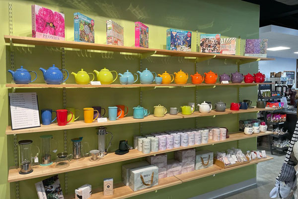 kettles cups tea and coffee stuff on shelves